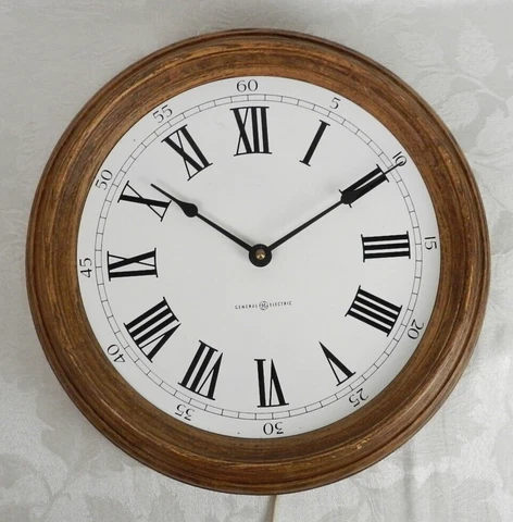 Vtg General Electric Wall Clock 2192 Round Roman Numerals Wood Grain Plastic 14" Cover