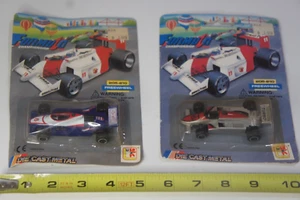 2 Stück - Druckguss Metall Vintage Spielzeug Indy Auto # 205-210 Freilauf Auto - NEU - Bild 1 von 14