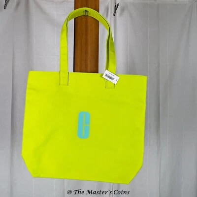 Bolso de hombro Clinique verde lima con estampado de logotipo Aqua "C" abierto para compras bolso de playa Foto 1 de 3