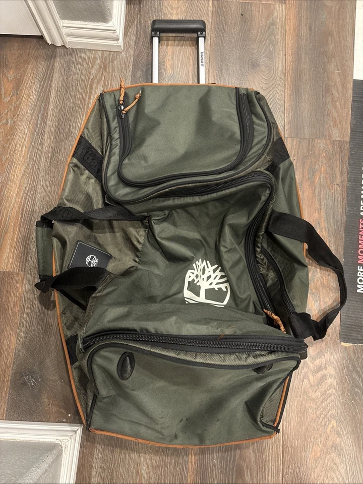 ¡Bolso de lona de viaje Timberland muy grande verde con ruedas!! Foto 1 de 4