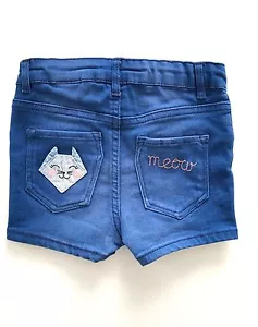 Pantalones cortos de jean H M para niñas con gatito gatito gato en bolsillo talla 3-6 meses - Imagen 1 de 3