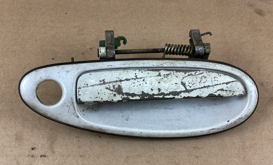 Manija de puerta exterior delantera lado pasajero Nissan Máxima 1995-1999 80606-41U10 OEM Foto 1 de 4