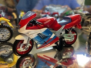 Maisto 1/18 Scale Yamaha Red, White, & Blue Ninja Sport Diecast Motorcycle Toy - Picture 1 of 6