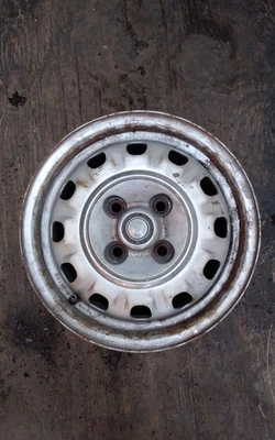 1980 1986 1990 DODGE OMNI   13 INCH STEEL WHEEL RIM 12 SLOT 4 LUG - Image 1 of 3