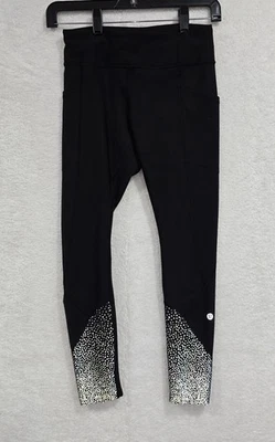 Leggings ajustados negros reflectantes Lululemon dobladillo festoneado bolsillo mujer talla 4 Foto 1 de 4