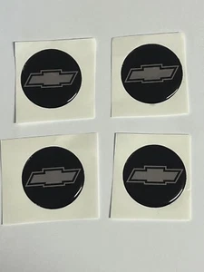4 EMBLEMS STICKERS BLACK/CHROMECHEVY SIZE 1 3/4 OR 44 MM DIAMETER FOR SPINNER - Picture 1 of 1