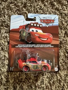 DISNEY PIXAR CARS 2025 Crypto Buster McQueen METAL SERIES - Picture 1 of 1