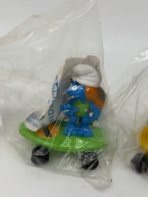 Juego Completo 6 PITUFOS PITUFOS HARDEE’S EXCLUSIVO TODAVÍA EN LOS ENVOLTORIOS ORIGINALES Foto 1 de 4