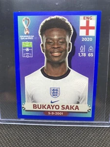 2022 Panini Fifa World Cup Sticker Bukayo Saka England ENG19 Blue Parallel - Picture 1 of 3