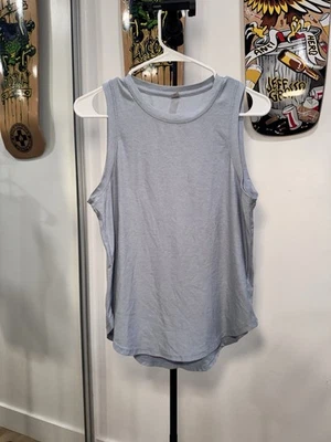 Beyond Yoga Camiseta Sin Mangas Azul Fluido Mujer Pequeña Foto 1 de 4