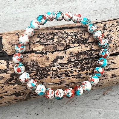 Armband Perlenarmband elastisch synth. Türkis gemustert weiss rot hellblau  - Bild 1 von 2