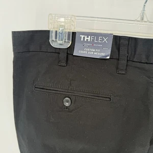 Pantalones chinos Tommy Hilfiger TH Flex ajuste personalizado negros para hombre talla 38x34 - Imagen 1 de 7