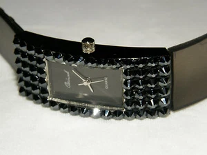 RELOJ NEGRO HEMITITA CRISTAL AUSTRIACO COINCIDE CON TODOS LOS COLORES BANDA NEGRA AHUMADA ¡NUEVO! - Imagen 1 de 6