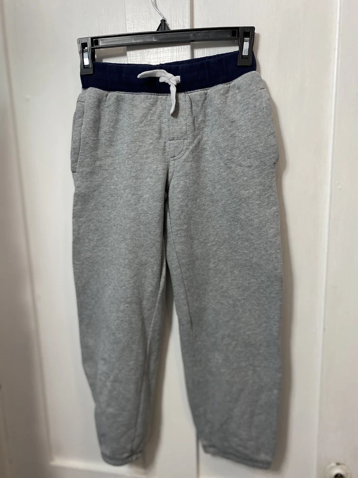 Pantalones deportivos Gymboree para niños talla 8 grises con cintura elástica azul con cordón usados en excelente estado Foto 1 de 4