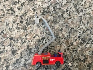 Vintage 1981 Matchbox red snorkel firetruck with extended bucket w/fireman - Picture 1 of 6