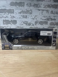 Shelby Collectibles 2006 Shelby GT-H Black with Gold Stripes 1:18 Scale - Picture 1 of 10