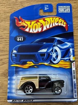 Black and Tan Morris Wagon 2001 First Editions Hot wheels - Image 1 of 3