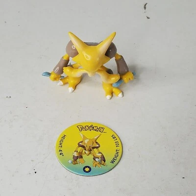Figura de PVC Alakazam de la película Pokémon de Tomy Hasbro 1998 de colección con disco de batalla #65 Foto 1 de 4