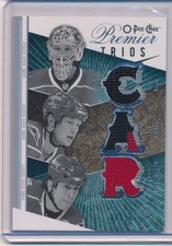 2009-10 O-Pee-Chee Premier Trios Cam Ward Eric Staal Robbb Brind'amour #/50