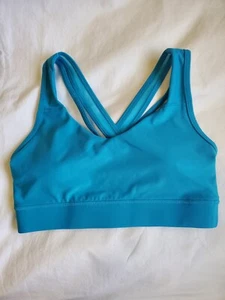 Avia Strappy Back Sports Bra Size SMALL Blue Pads Back Straps Medium Support NEW - Picture 1 of 3