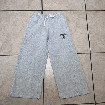 Pantalones deportivos informales forrados de vellón de pierna ancha gris talla 8 de Zara para niñas Foto 1 de 4