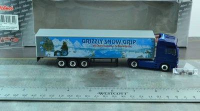 Schuco 22642 MAN TGA Tractor Trailer Truck Grizzly Snow Grip 1:87 - Image 1 of 3
