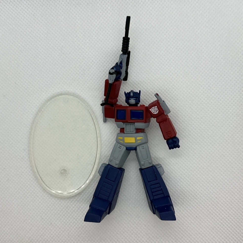 Transformers SCF PVC Act 6 Optimus Prime Convoy con Pistola Megatron - Color Estaño Foto 1 de 4