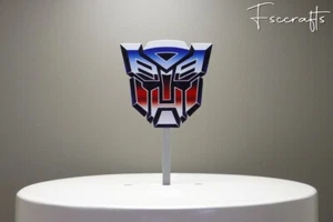 Topper de pastel temático Transformers - Imagen 1 de 2