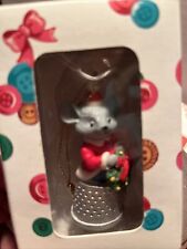 Grey Mouse in a Santa Suit & Cap sitting on Thimble & holding a Christmas Wreath