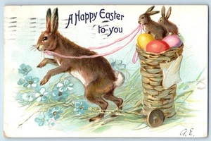 1908 Easter Rabbit Pulling Basket With Eggs And Bunnies Embossed Tuck Postcard - Picture 1 of 2
