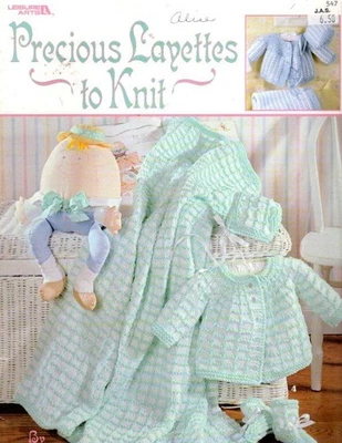 LEISURE ARTS PRECIOUS LAYETTES TO KNIT 4 PRETTY DESIGNS - Image 1 of 4