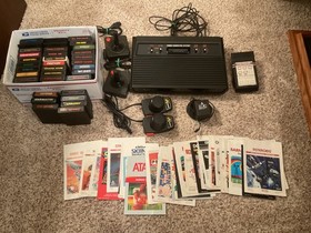 ATARI 2600 Vader 4 Switch System  37  Games and Manuals    Tested   Working