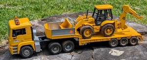 Bruder MAN TGA Low Loader Truck with JCB 4CX Backhoe Loader / Tractor - Picture 1 of 14