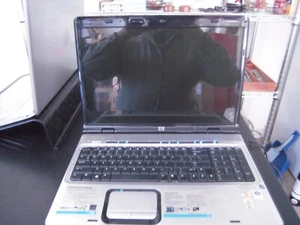 HP DV9812US 17" LCD WINDOWS VISTA AMD TURION 64 X2 CHIP (FOR PARTS OR REPAIR) - Picture 1 of 18