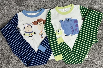 Sz 130 8 Boy Girl Hanna Andersson Pajamas Pjs Toy Story Monsters Inc Long Johns - Image 1 of 4