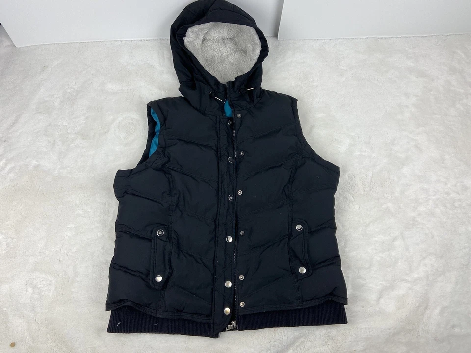 Chaleco Baileys Point Down Fill para mujer grande negro frente a presión con capucha ribete de piel sintética Foto 1 de 4