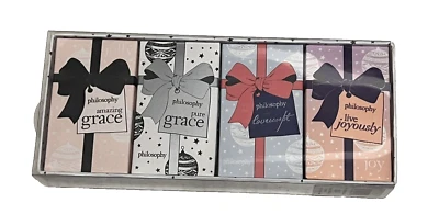 COTY Filosofía Gracia Increíble, Gracia Pura, Amor Barrido y Vivir Alegremente Set de Regalo Foto 1 de 4