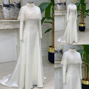 Abiti da sposa musulmani in raso eleganti con mantello bianco maniche lunghe abiti da sposa - Foto 1 di 10