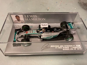 1/43 Minichamps Mercedes AMG W06 USA GP Winner 2015 Champion Hamilton Rain tyres - Bild 1 von 3