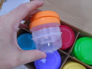 NUEVO Juego de 12 tapas multicolores para tarros de comida para bebés Wee Sprout Glass Storage de 4 oz - Imagen 1 de 5