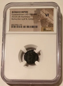 Impero Romano Costantiniano c AD 330-340 AE3/4 BI Nummus Lei-Lupo/Gemelli VF NGC - Foto 1 di 4