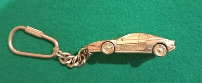 BURAGO MODELLINO PORTACHIAVI FERRARI TESTAROSSA COLOR ARGENTO 1/87 KEYCHAIN - Immagine 1 di 4