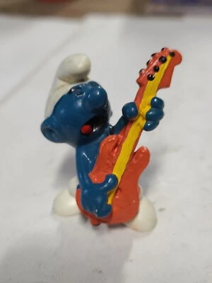 DE COLECCIÓN 1980 SCHLEICH LOS PITUFOS Pitufo Tocando Guitarra 2" PVC FIGURA JUGUETE AÑOS 80 Foto 1 de 3