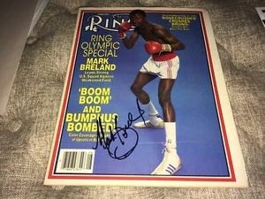 Cubierta de cargador de anillo firmada por Mark Breland Boxing con nuestro certificado de autenticidad - Imagen 1 de 2