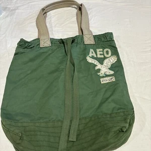 American Eagle Outfitters grüne Beuteltasche Tasche Kordelzug irisierendes Logo - Bild 1 von 6