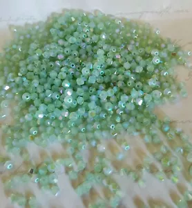 Swarovski 5328 3mm bicone beads, Chrysolite Opal Shimmer 2X (36pcs) - Picture 1 of 2