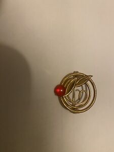 Vintage High Fashion Brooch Gold Tone Circle With red Stone And Leaves Design