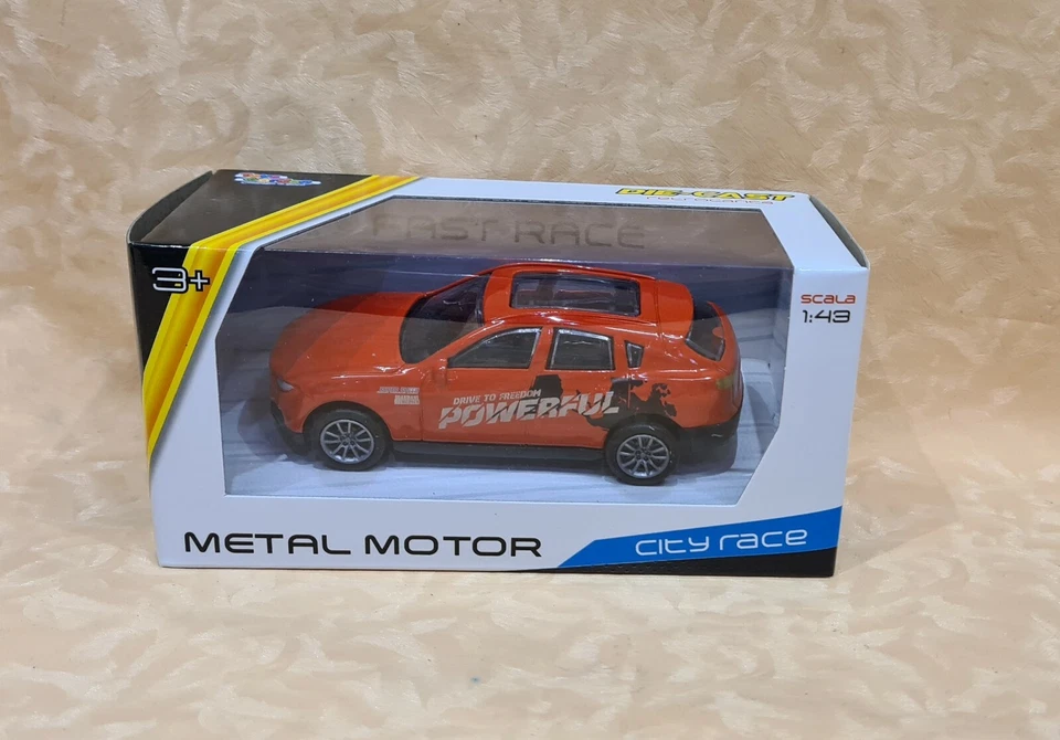 AUTO ARANCIONE ARGENTO MODELLINO IN METALLO SCALA 1:43 RETROCARICA cod.26837 - Immagine 1 di 1