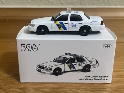 596 1:64 Ford Crown Victoria P71 New Jersey State Police Trooper K-9 Unit 1/1499 - Image 1 of 4