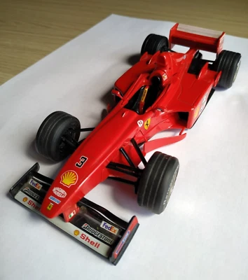 Modellino Automobile Bburago Formula 1 Ferrari F300 1/24 Rossa Red Schumacher 3  - Immagine 1 di 4